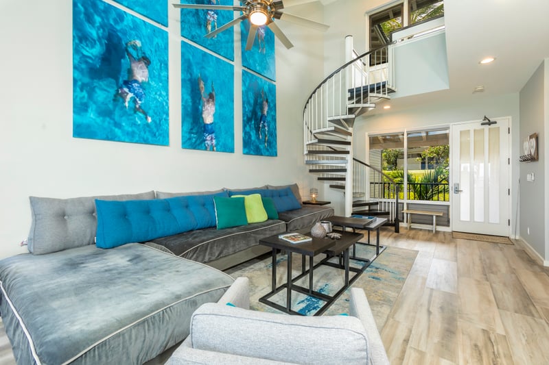 With an open layout that leads directly to an oceanfront lanai, this living room is your launchpad to paradise