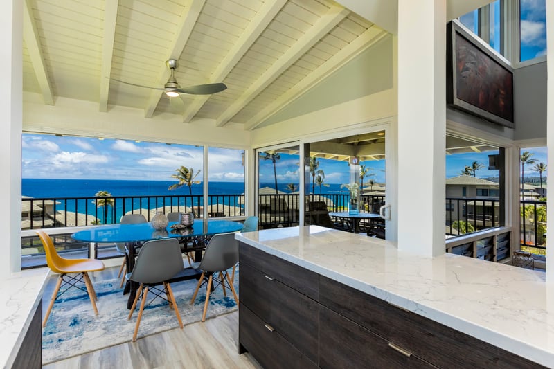 Ocean breezes meet culinary ease in this contemporary kitchen with thoughtful details and unbeatable views