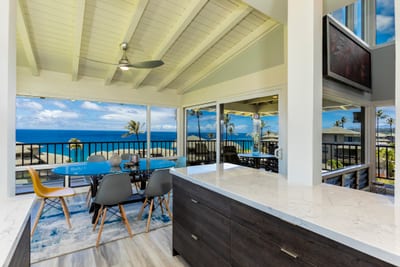 Ocean breezes meet culinary ease in this contemporary kitchen with thoughtful details and unbeatable views