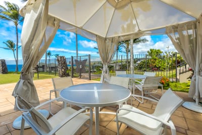 Relax in style beneath our poolside cabana—an ideal spot to unwind after a refreshing swim with ocean view