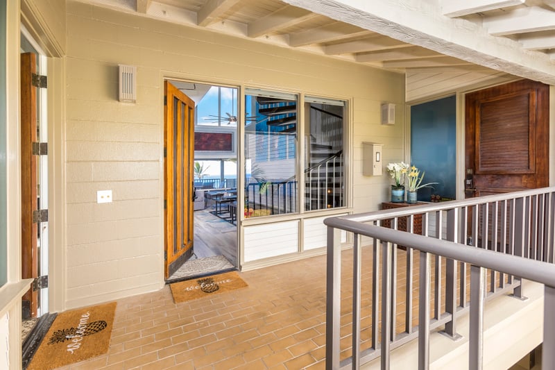 Step into coastal comfort—your island escape begins at this breezy, welcoming entrance with ocean views