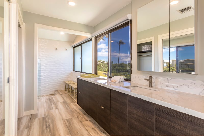 Modern finishes, floating shelves, and natural light make this kitchen a design-forward retreat for food lovers