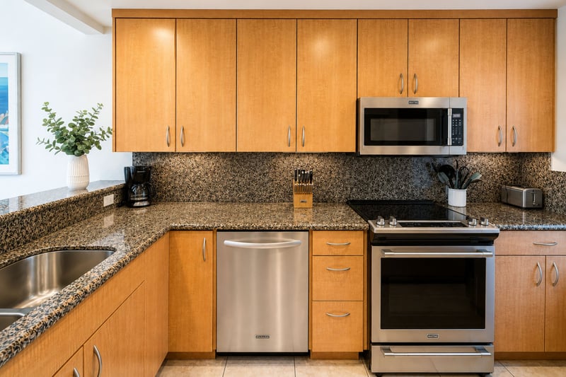 Prepare vacation favorites in your spacious kitchen, featuring generous cabinetry, broad counters, and full size appliances.