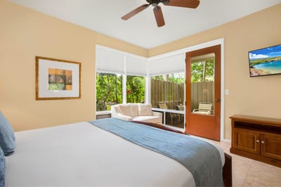 Drift into relaxation in this serene bedroom with tropical light and tasteful decor KBV-34G4