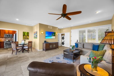 Stay connected with friends or stream a show from the large sectional facing the 55" Smart TV.