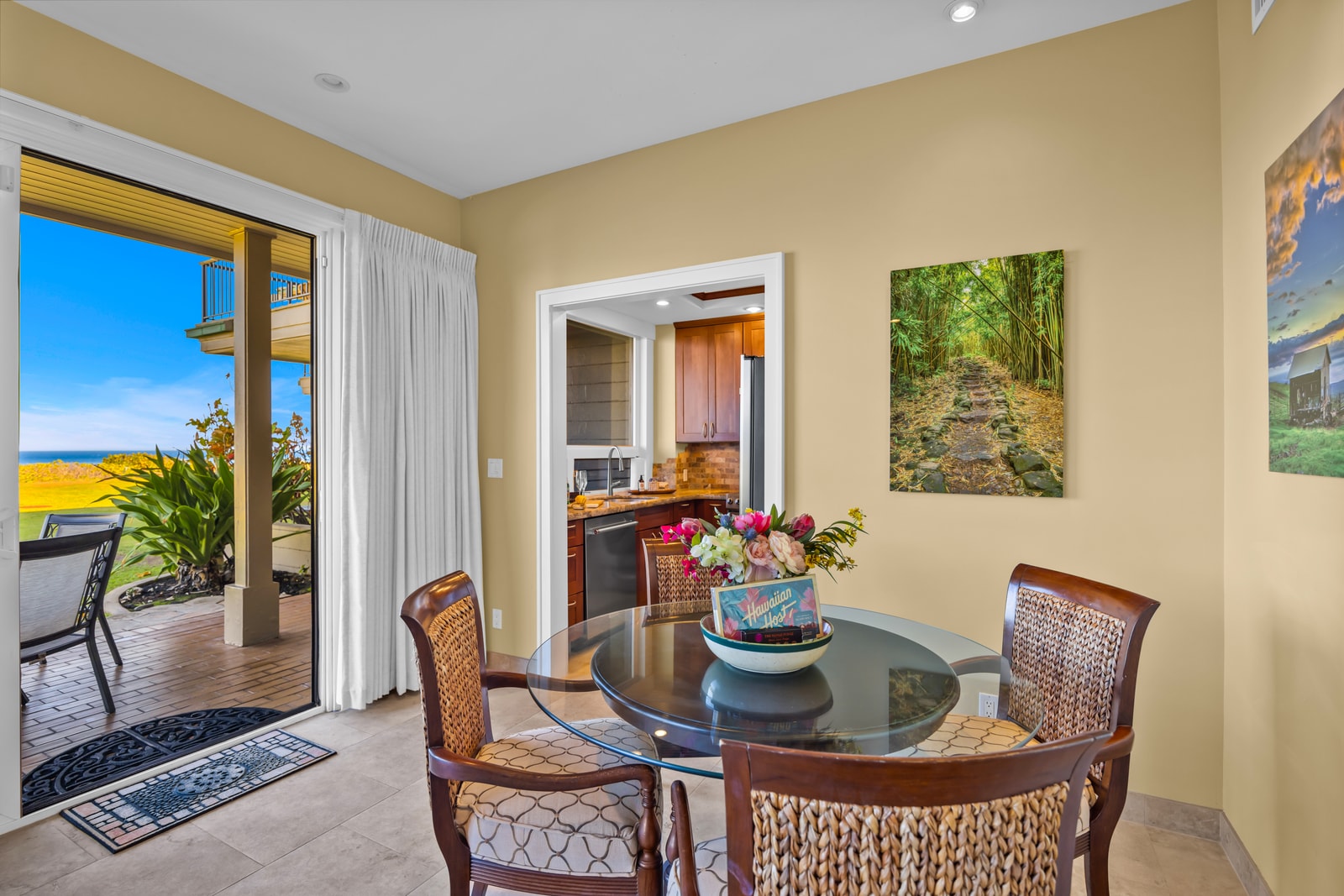 Your dining table sits just off the lanai, perfect for casual island meals.