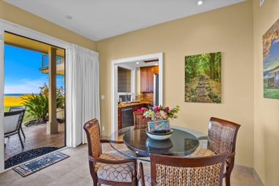 Your dining table sits just off the lanai, perfect for casual island meals.