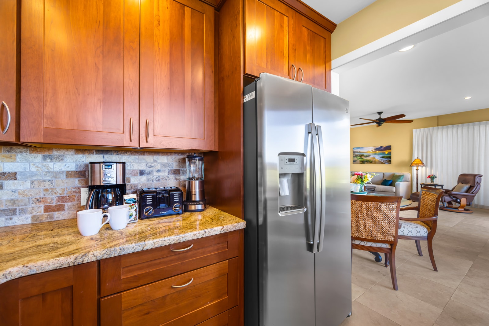 A full suite of appliances, including a French-door fridge, supports longer stays and fresh meals.