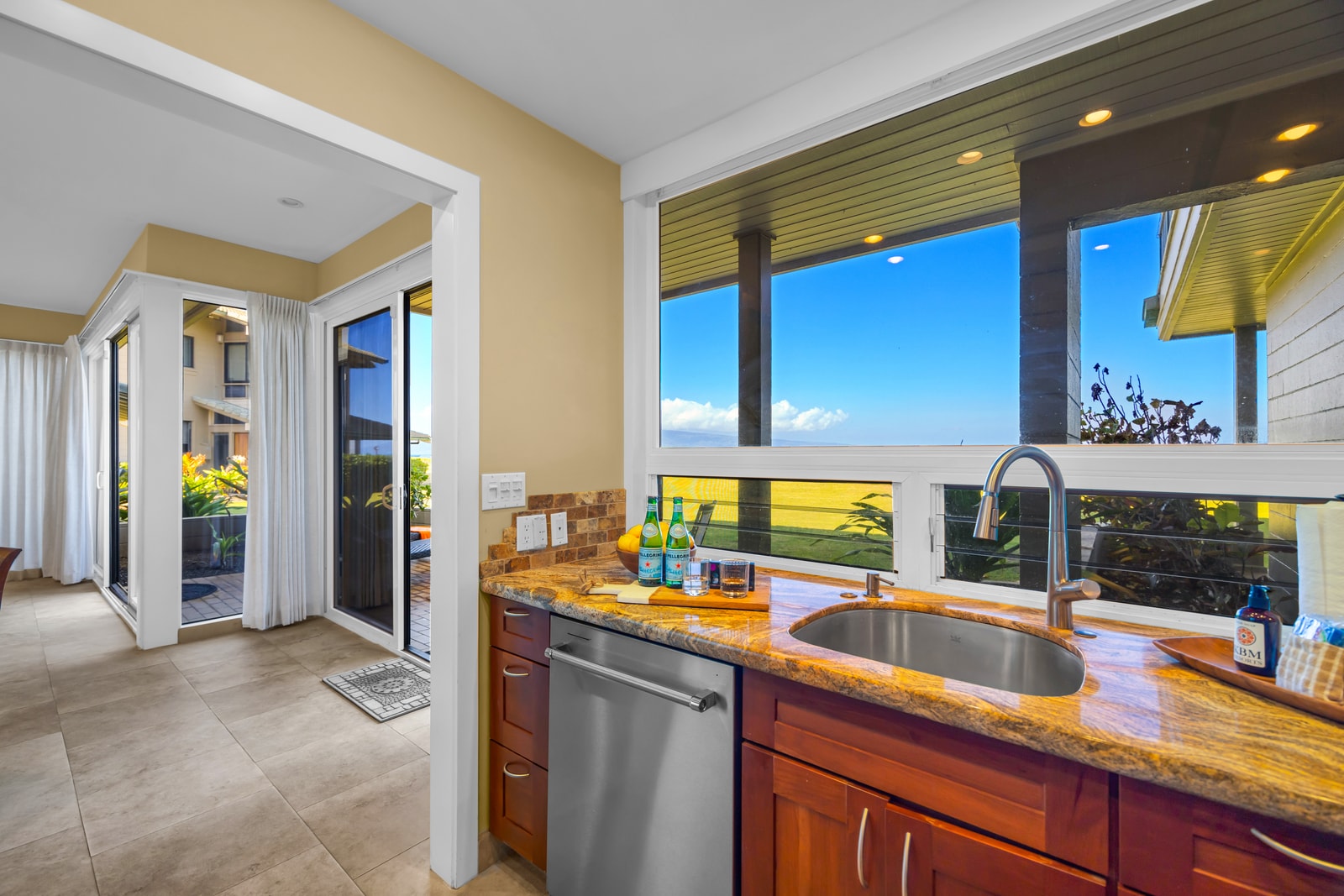 Open kitchen design lets you prep while still enjoying views and conversation.