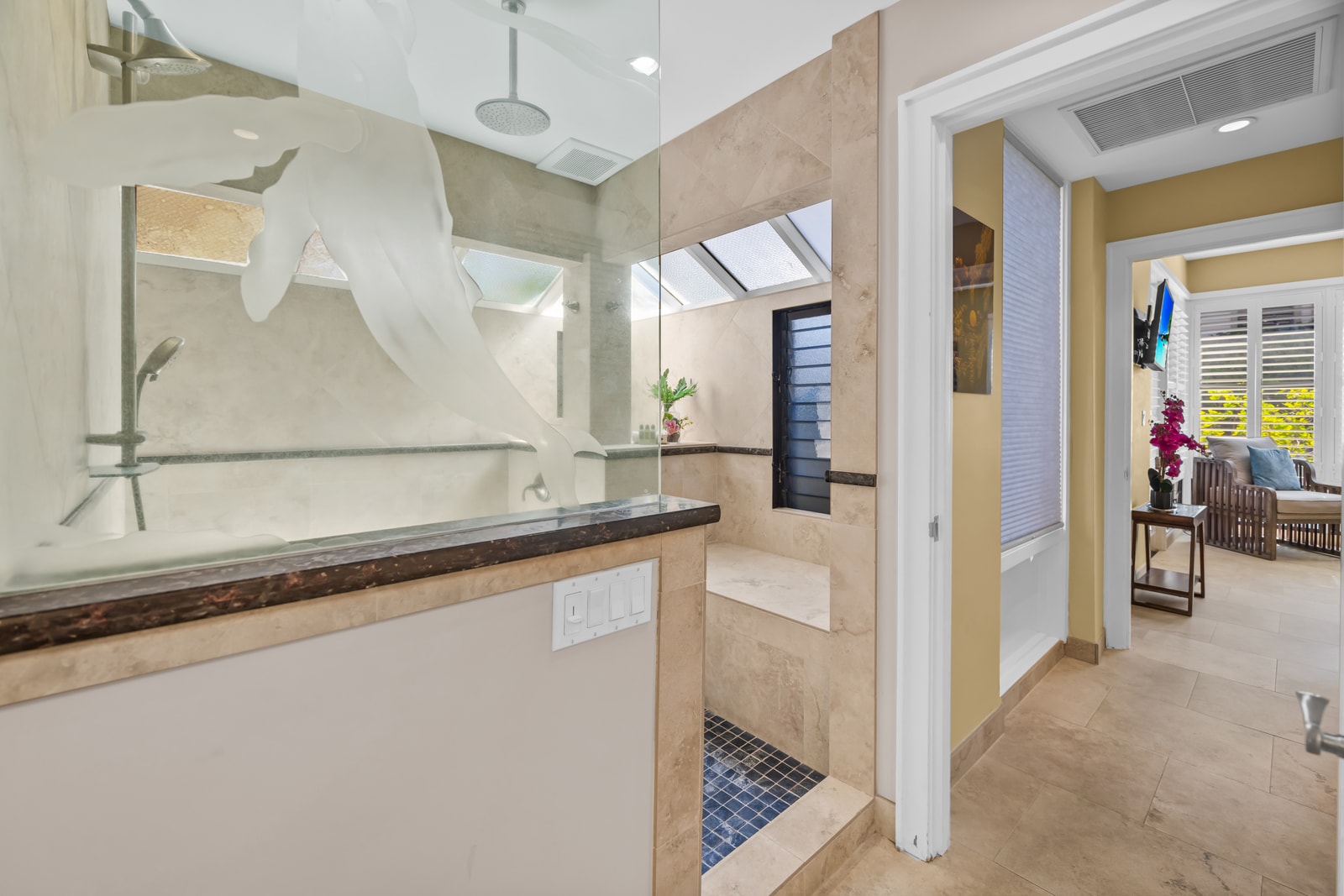 Walk-in shower and granite vanity create a spa-like feel in your primary bath.