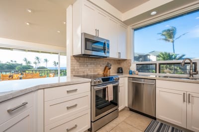 Prepare fresh island meals with ease in a fully equipped kitchen where style, light, and comfort blend effortlessly