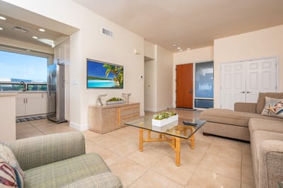 Neutral tones meet bold art, blending serenity with personality in this relaxing, resort-style space