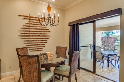 Start your morning with coffee at this round table, where sunlight streams in and the patio calls for a slow, breezy breakfast KGV-14P3
