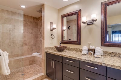 Elevate your mornings and unwind in style—this spa-inspired bathroom offers dual vanities, a deep soaking tub, and endless calm KGV-14P3