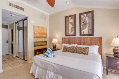 Unwind in a space that speaks peace and palm-lined luxury, where every detail—from the fan to the florals—invites relaxation KGV-14P3