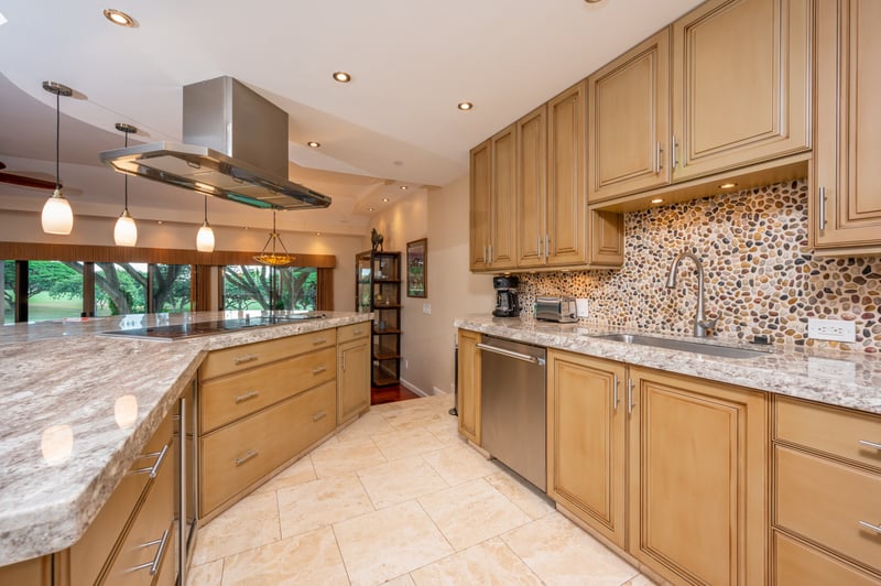 This gourmet kitchen features luxe countertops, custom cabinetry, and modern appliances—ready for any culinary adventure KGV-14P6