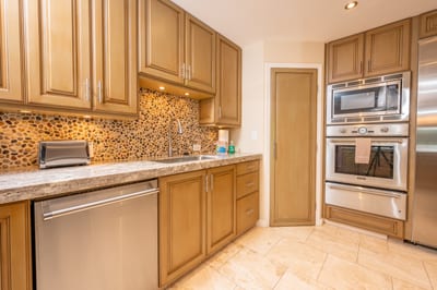 Polished finishes, generous space, and top-tier tools make this kitchen both a showstopper and a joy to cook in