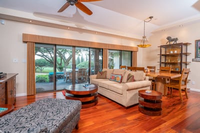 Warm wood floors, cozy textures, and lush garden views—this is where nature meets refined comfort