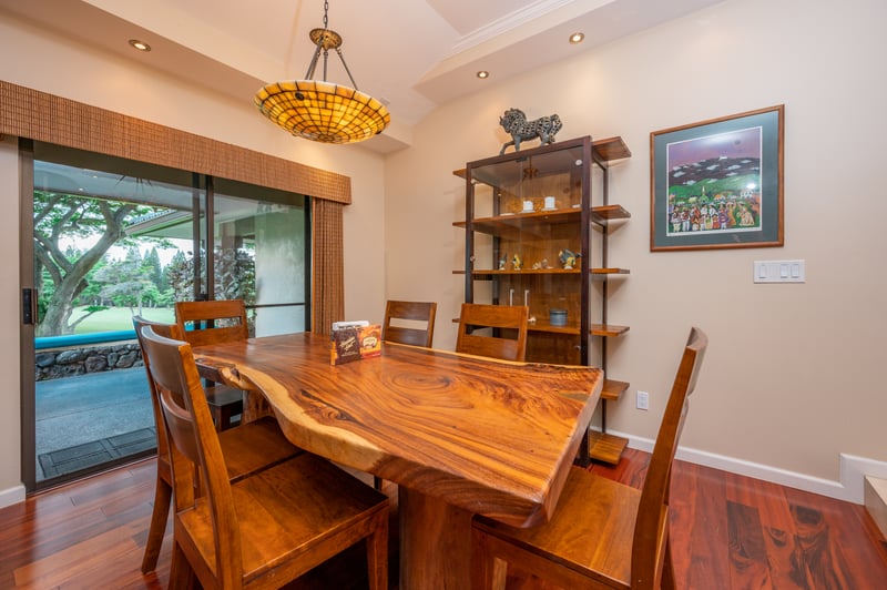 Carved from nature, framed by windows, and lit with island glow—this dining area is the heart of the home in all the right ways KGV-14P6