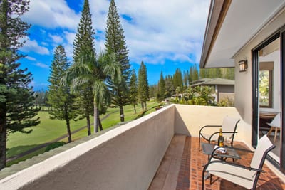 Whispers of wind through tall pines, the clink of silverware, and endless views—this lanai is pure island enchantment KGV-14V3