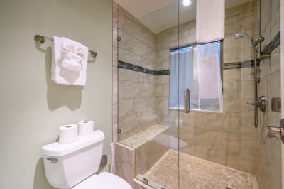 After a dreamy night’s sleep, wander in for a warm shower and soft towel, surrounded by natural stone and thoughtful charm