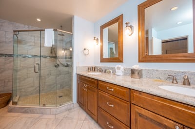 Two sinks, perfect lighting, and a shower that feels like a retreat—this bathroom was made for easy mornings and breezy nights KGV-16P3