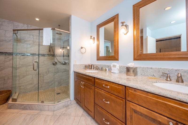 Two sinks, perfect lighting, and a shower that feels like a retreat—this bathroom was made for easy mornings and breezy nights KGV-16P3