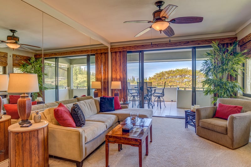 Bright, open, and beautifully furnished, this living room invites long conversations and lazy island afternoons