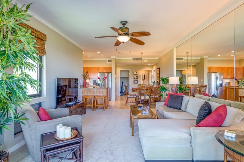 Spacious, mirror-lined elegance with cozy seating and tropical touches—perfect for relaxing or entertaining in style