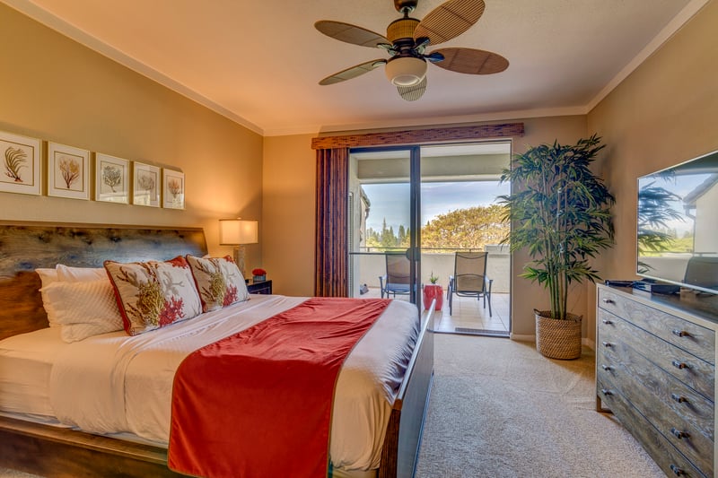 Golden tones, soft linens, and a view worth waking up for — this master suite is comfort wrapped in coastal charm