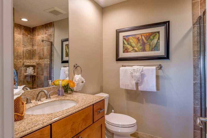 Soft lighting, warm wood, and thoughtful decor create a cozy, refined retreat