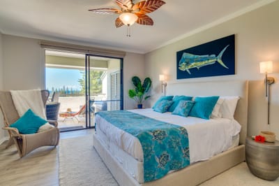 Whether you're relaxing with a book or watching the sky change color, this bedroom is where your island story begins KGV-17T5
