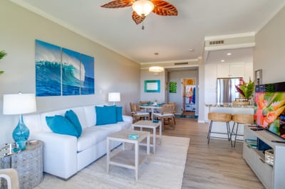 Calm coastal tones, elegant finishes, and space to stretch out make this the perfect retreat after island adventures KGV-17T5