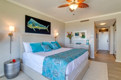 With cool tones, plush comfort, and lanai doors that invite the outdoors in, this master suite is the heart of your stay KGV-17T5
