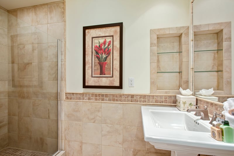 Whether you're prepping for an island adventure or winding down, this bathroom is equal parts spa, charm, and comfort