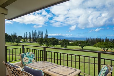 Sip your morning brew or sunset cocktail on this charming lanai—where the golf greens glow and skies stretch forever