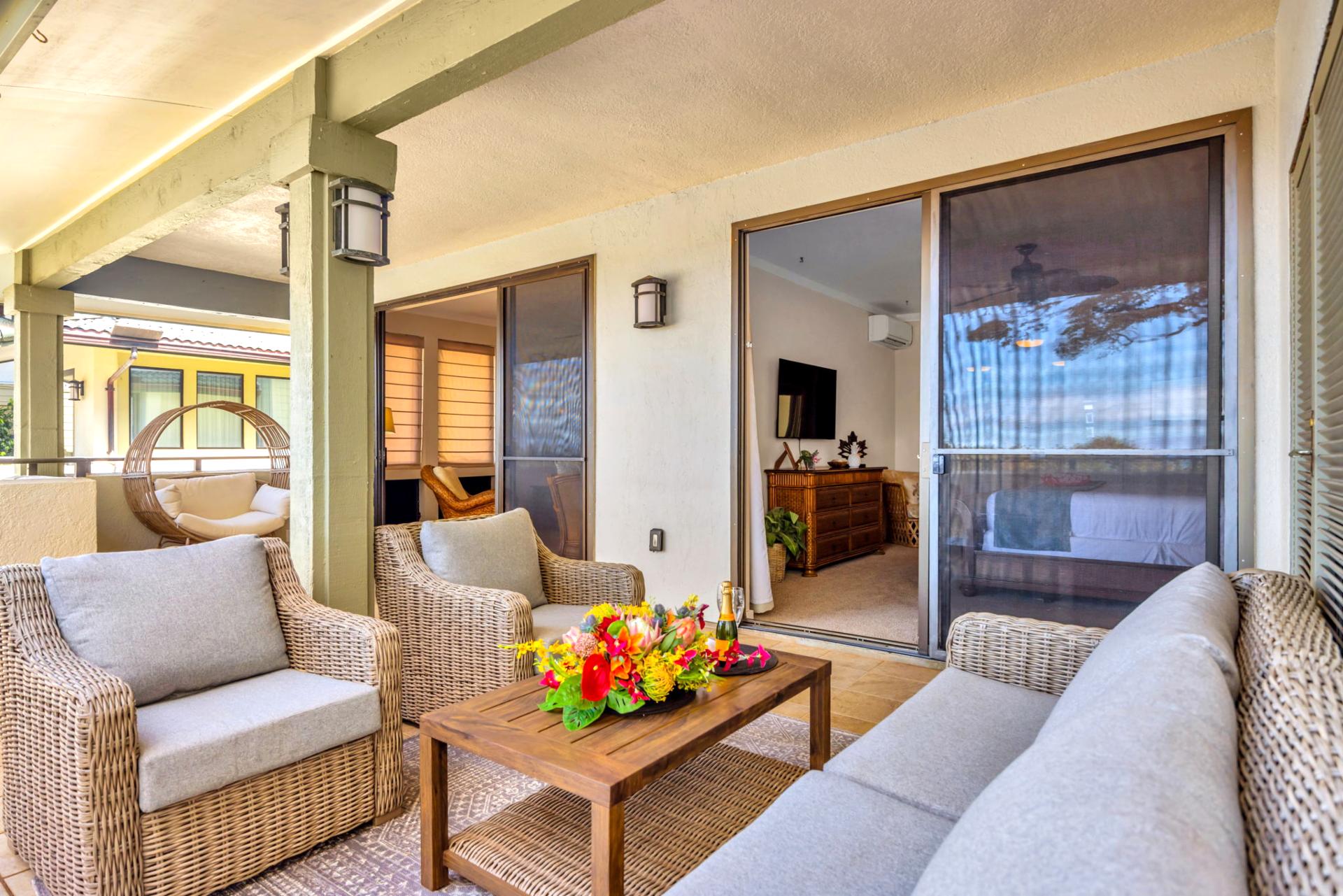 Seamless indoor-outdoor flow from the living area to the furnished lanai for easy island living.