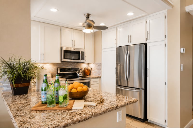 Open to the dining area, the kitchen layout makes it easy to cook, serve, and linger over meals together. KGV-18T4