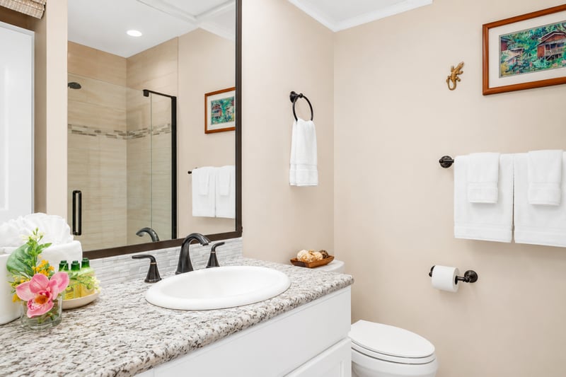 The second bathroom also has a walk-in shower and luxury L'Occitane amenities.