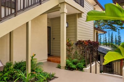 The entrance to your villa is surrounded by gardens and tropical foliage.