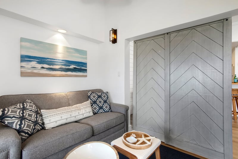   Tucked away and tranquil, this stylish den is your perfect corner for coffee, conversation, or curling up with a good book  KGV-19P2