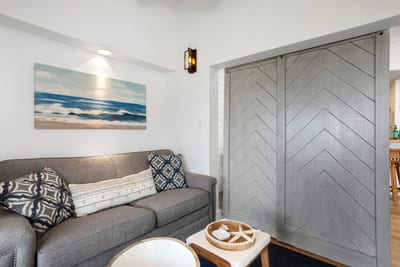 Tucked away and tranquil, this stylish den is your perfect corner for coffee, conversation, or curling up with a good book KGV-19P2
