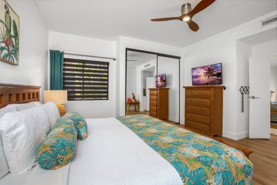 After beach days and sunset strolls, this tranquil master bedroom welcomes you back with a soft embrace KGV-19P2