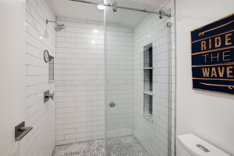 A rainfall shower that rinses off travel days and rinses in total calm   