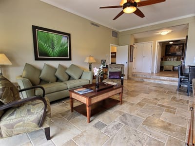 Tile floors, tropical doors, and sunset galore—this room’s got vacation written all over it