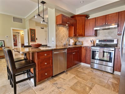 You cook, they chat from the barstools—this open layout turns meals into moments, and strangers into lifelong friends