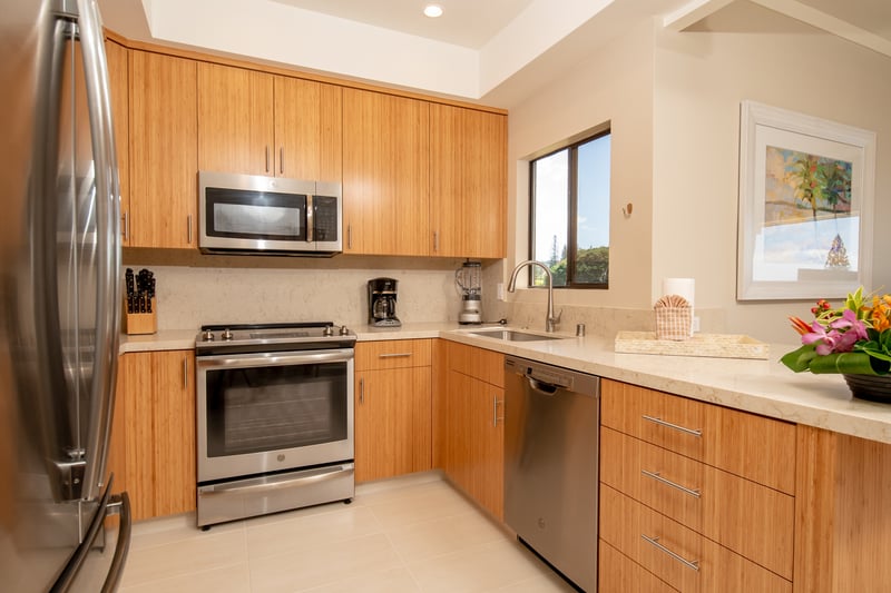 A clean, contemporary space with natural tones and pro-level tools—ideal for cooking or simply enjoying the view KGV-19T1