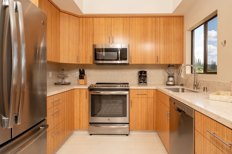 Stainless steel, warm wood, and natural light combine in this stylish kitchen built for beauty and function KGV-19T1