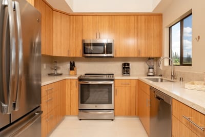 Stainless steel, warm wood, and natural light combine in this stylish kitchen built for beauty and function KGV-19T1