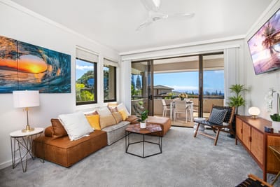 Where coastal elegance meets comfort, kick back on the caramel suede sofa and soak in those endless sky-blue views KGV-20T2